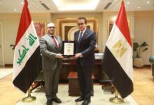 وزير الصحة مع نظيره العراقي